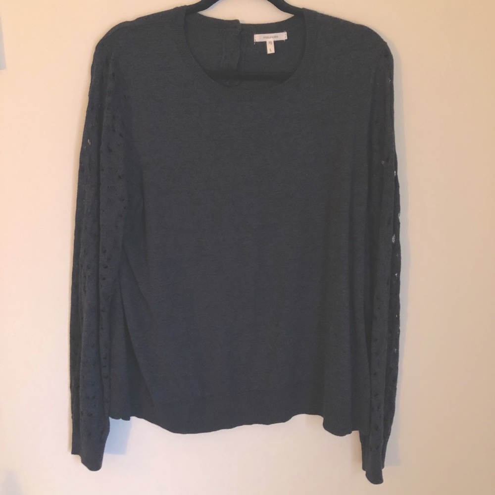 Dark blue sweater with open gauge sleeves